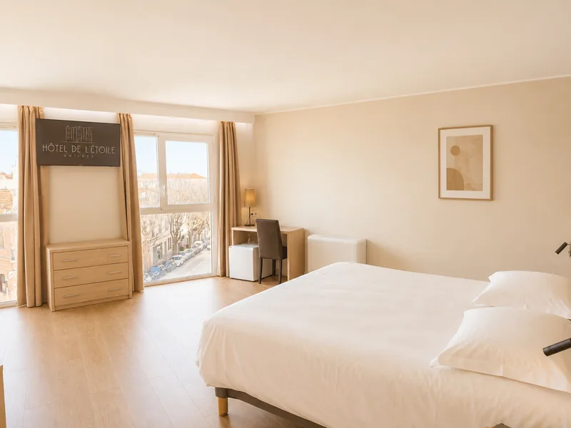 Double bed and seating space in a family room